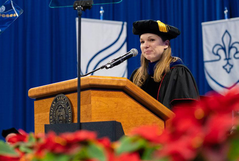 Katie Kelting, Ph.D. address the 2019 midyear commencement graduates. 