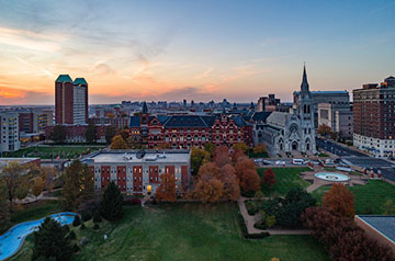 SLU's north campus pictured from the air at dusk.