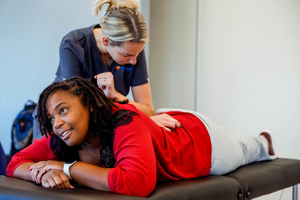 A woman gets a massage at an employee health fair