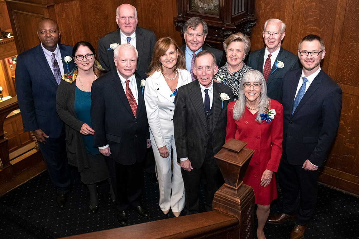 Saint Louis University School of Law Order of the Fleur de Lis 2020 Honorees pose with Dean William P. Johnson at the induction ceremony on Feb. 7, 2020. Photo by Steve Dolan