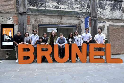 Global Career Readiness: US-UK Immersion Students standing in front of a Brunel University sign.