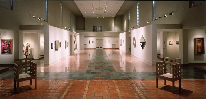 A wide-angle view of MOCRA's nave gallery featuring artworks from the exhibition Consecrations: The Spiritual in Art in the Time of AIDS