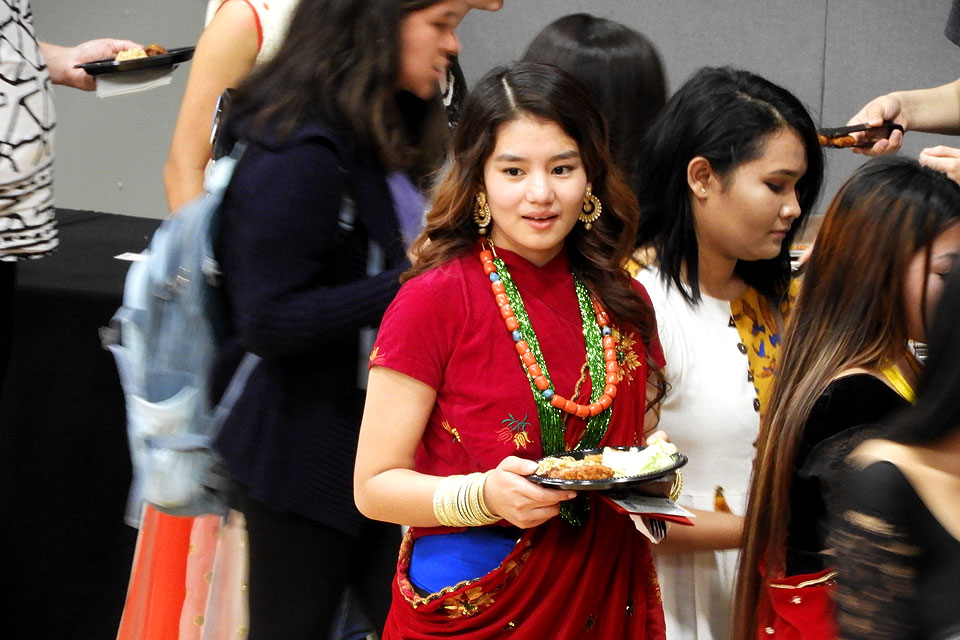 Student participating in the food festival