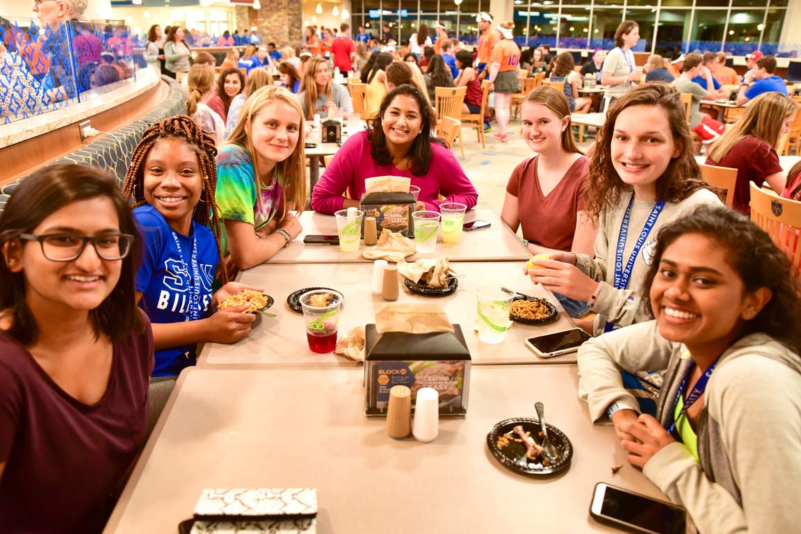Students in Grand Hall's dining facility