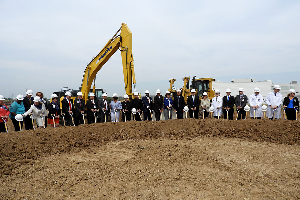 Fred P. Pestello and other dignitaries break ground on the new hospital.