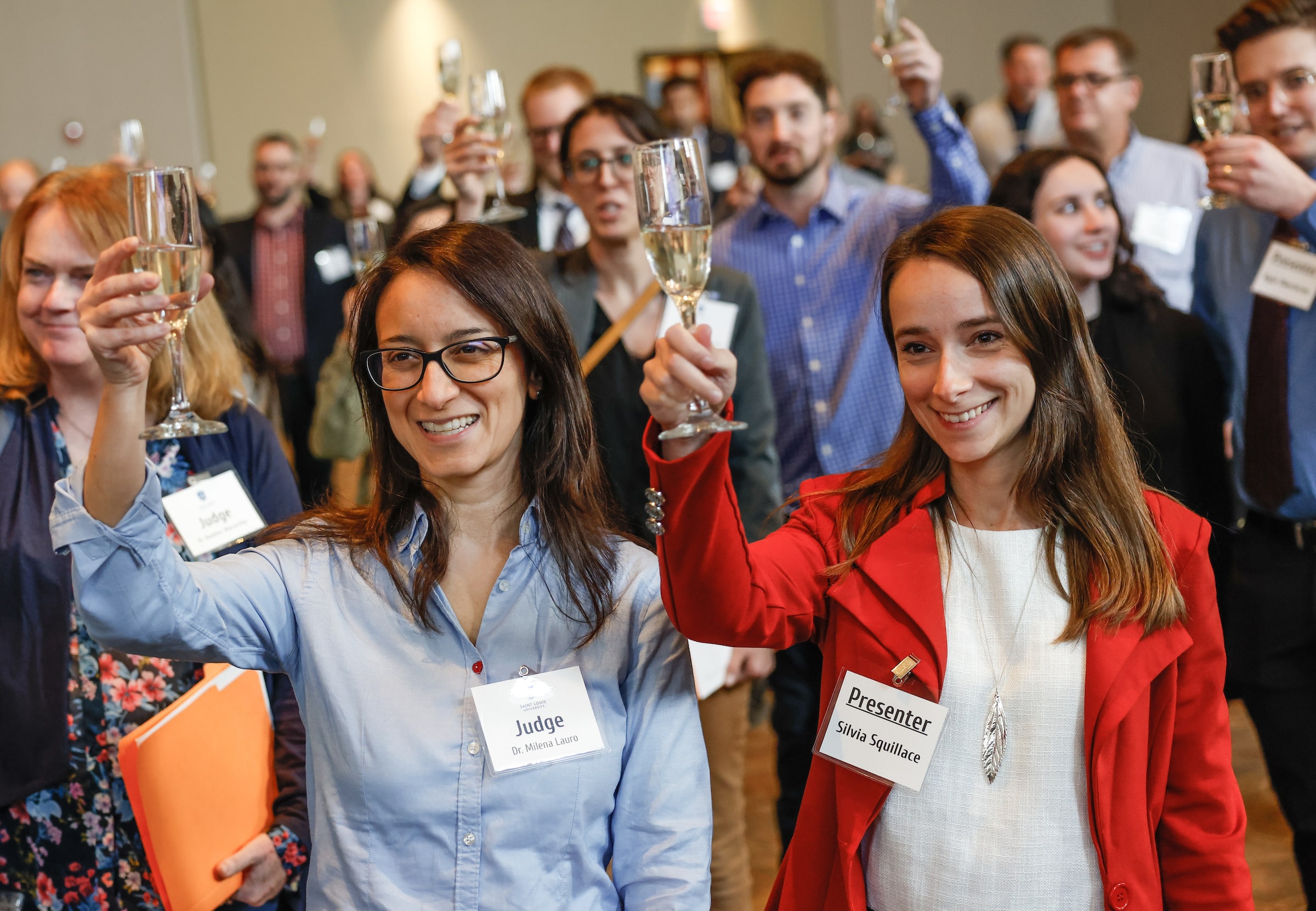 A toast is raised to celebrate the new Institute of Translational Neuroscience during the fourth annual Neuroday on November 2, 2022. Photo by Sarah Conroy.