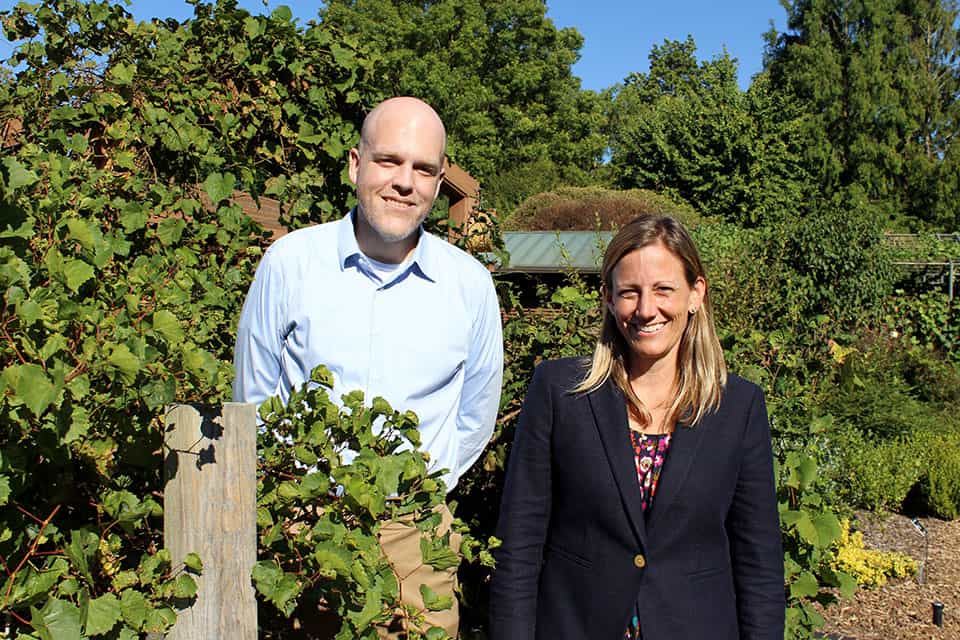 Allison Miller (right, Saint Louis University Department of Biology) is leading a research team including Dan Chitwood (left, Danforth Plant Science Center), and scientists from Missouri State University, South Dakota State University, University of Missouri - Columbia, and U.S. Department of Agriculture, to study grafting in grapevines. Planned outreach activities include training and educational displays displays at the Missouri Botanical Garden and elsewhere (shown here). Photo credit: Laura Klein