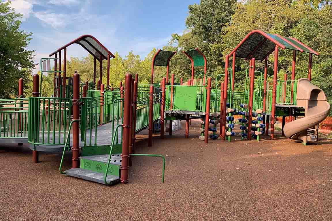 Play structure with swings.