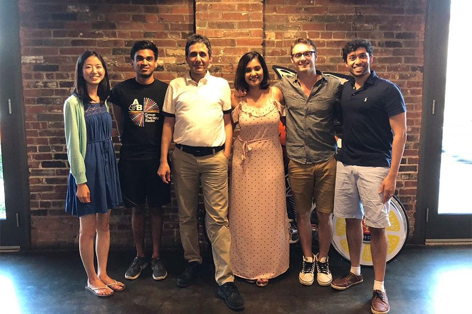 Slide 2 group photo of child neurology residents together inside