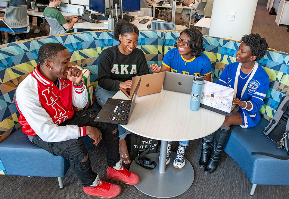 Students from SLU's National Pan-Hellenic Council (also known as the Divine 9), representing our historically Black fraternities/sororities. SLU is home to eight chapters in the Divine 9.