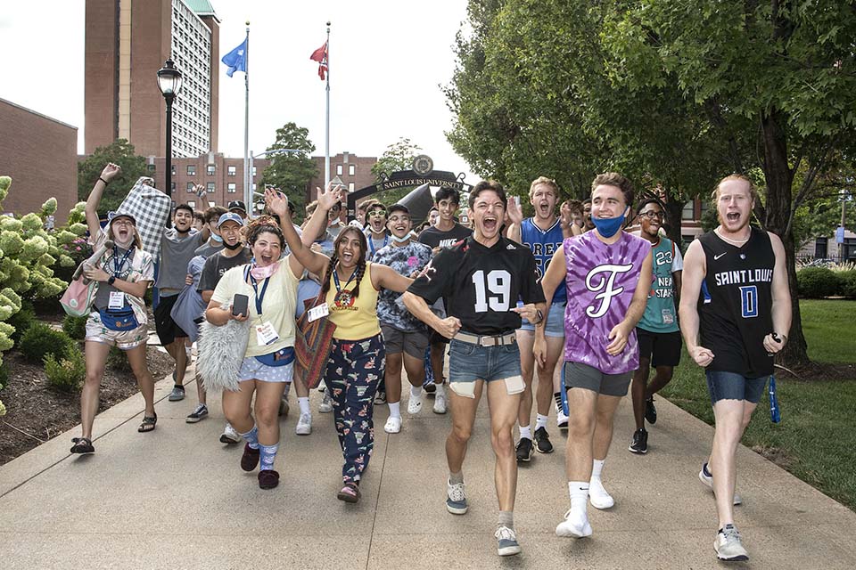 Billikens march through campus on the way to Robert R. Hermann Stadium to watch a men's soccer game Saturday, Aug. 21. Photo by Steve Dolan.