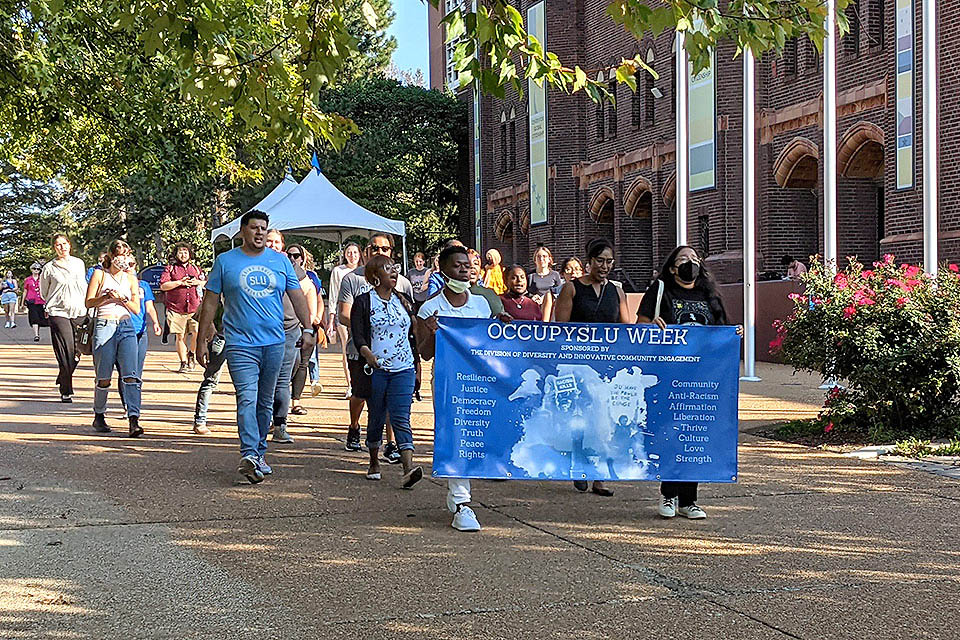 Occupy SLU week kicked off Friday, Oct. 8, with a procession through campus in memory of VonDerritt Myers Jr. Photo by Clayton Berry.