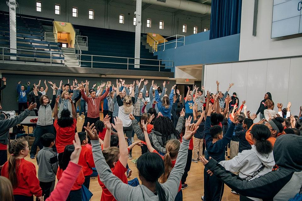 Student dancers face off at the Catholic School Olympics at Simon Recreation Center in 2019.