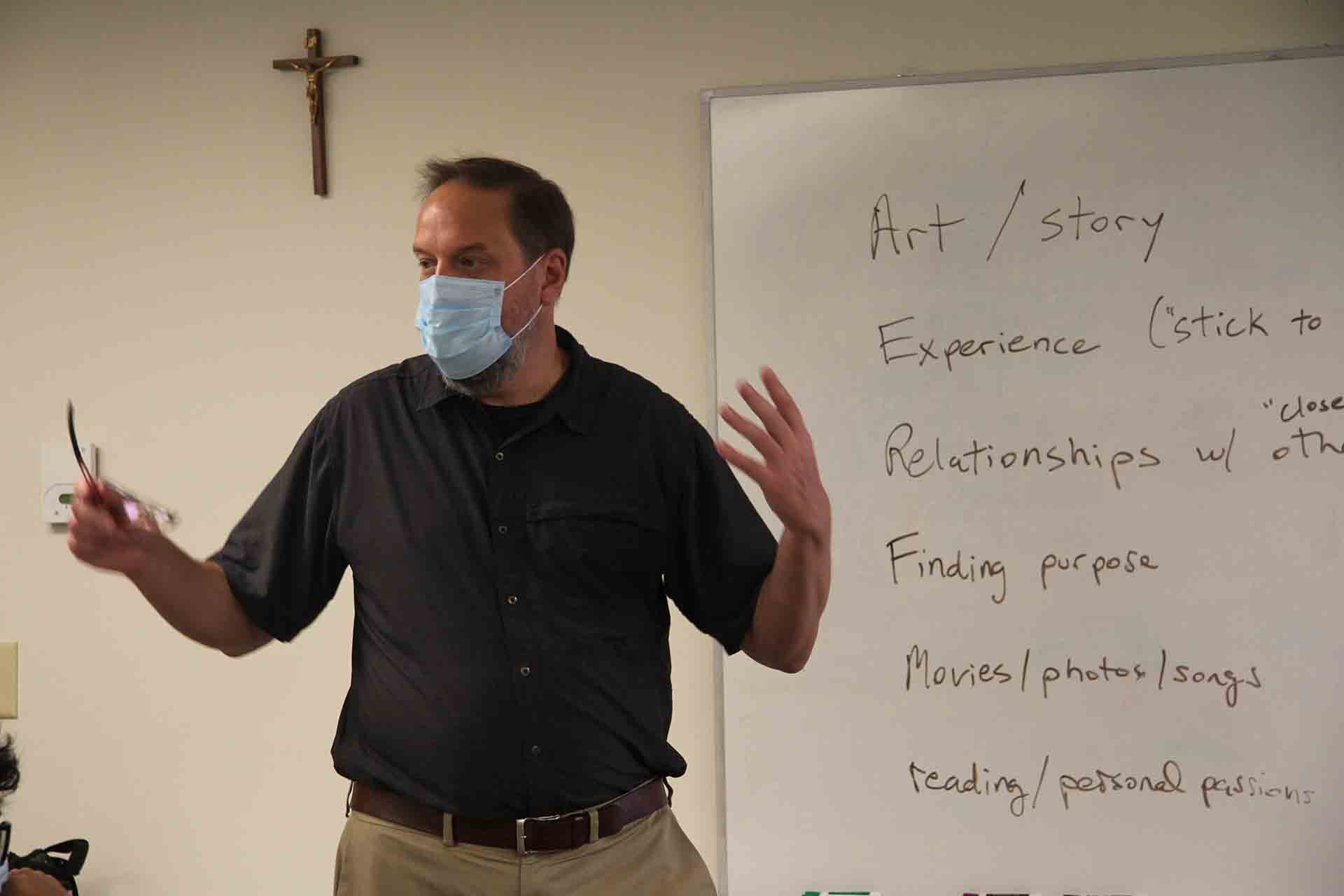 A SLU professor leads a class in discussion.