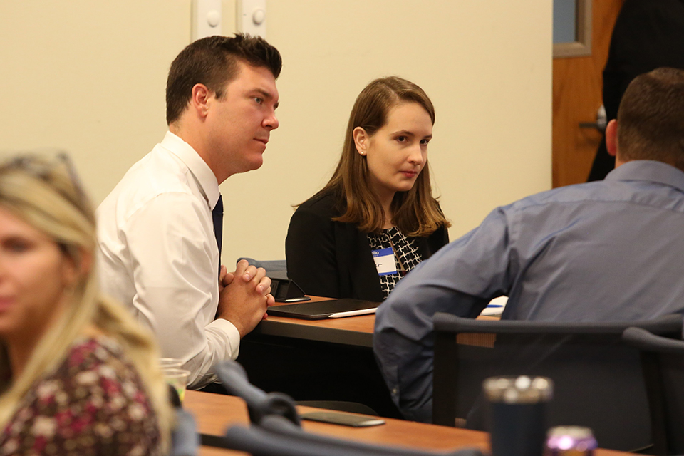 Students and industry leaders network during the Executive Master of Health Administration weekend event.