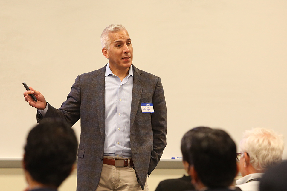 Students and industry leaders network during the Executive Master of Health Administration weekend event.