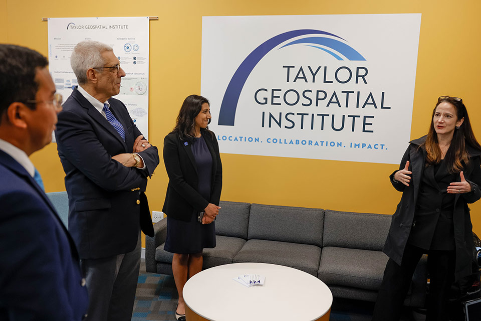 U.S. Director of National Intelligence, Avril Haines, right, talks with Vasit Sagan, Ph.D, left, about the Taylor Geospatial Institute during a tour of the ISE Building in connection with a recently announced grant SLU received from the Office of the Director of National Intelligence. Photo by Sarah Conroy.