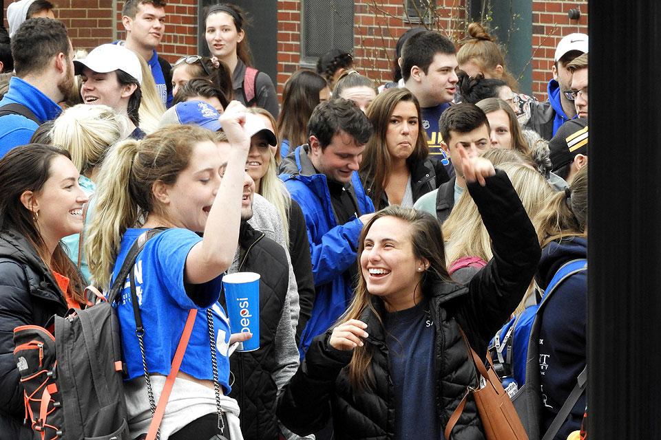 Students cheer and get ready for the NCAA Tournament Lottery on Wednesday, March 20.