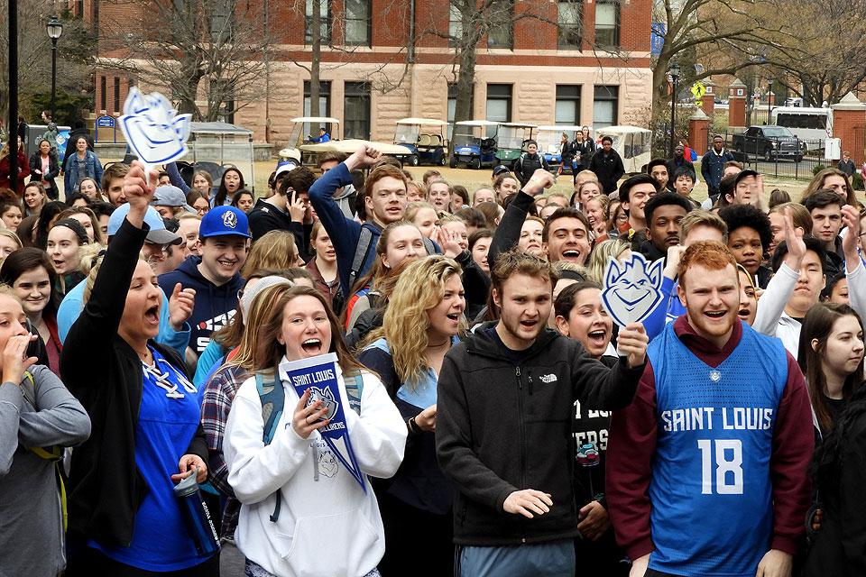 SLU students cheer for lucky classmates.