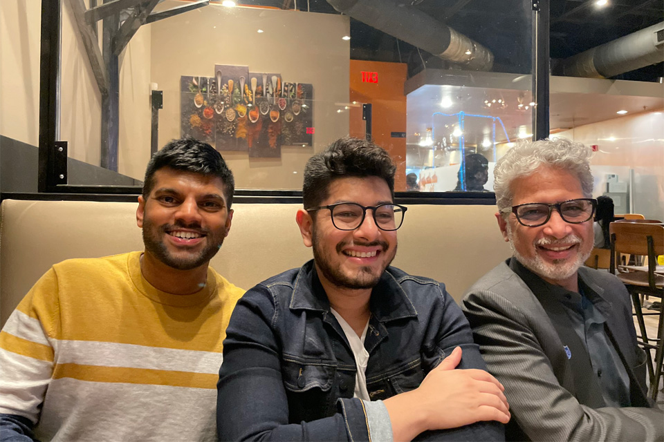 Fellows having dinner with our chairman at a local restaurant
