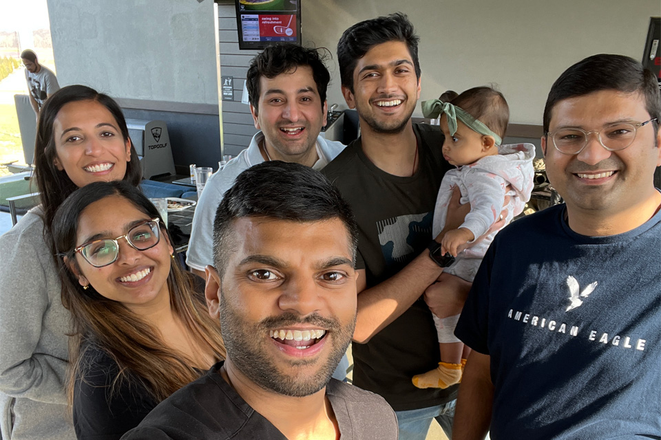 Our fellows mingling at a wellness event at Top Golf Saint Louis