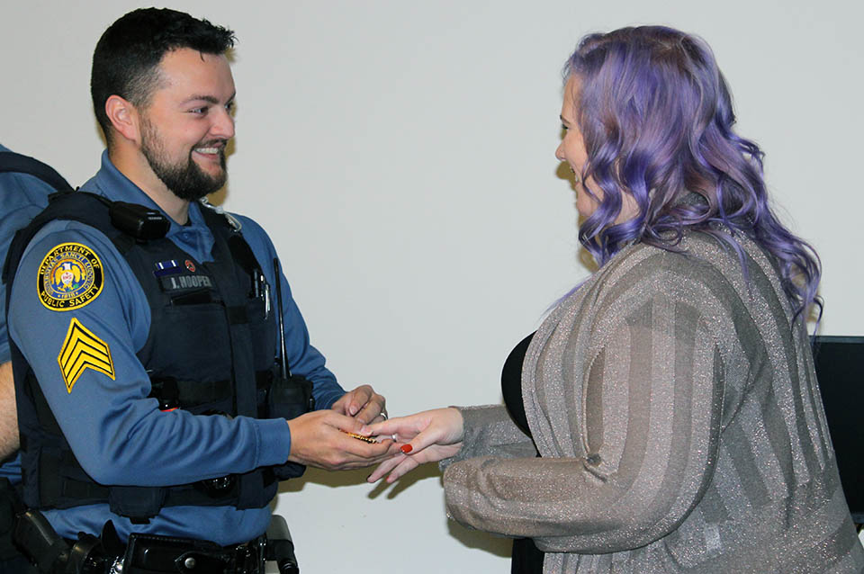 Joseph Hooper, Sergeant/A-Watch Supervisor, was pinned by his wife Cathy Hooper during a DPS pinning ceremony on Wednesday, Nov. 16, 2022. Photo by Joe Barker. 
