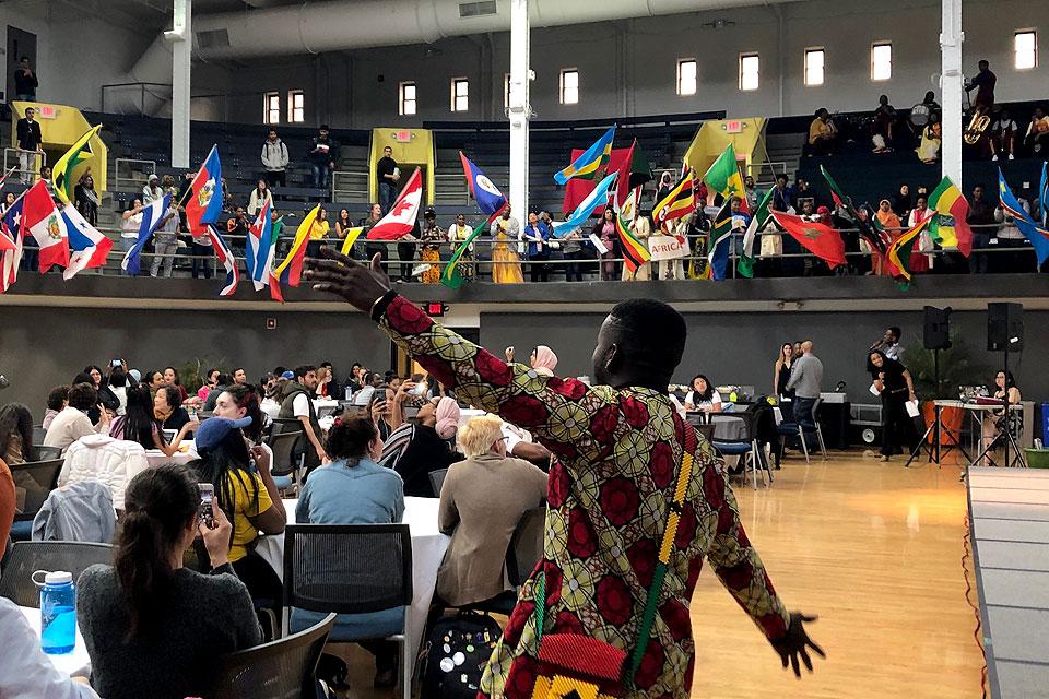 A student sways as SLU celebrates at the Billiken World Festival at a past Atlas Week.