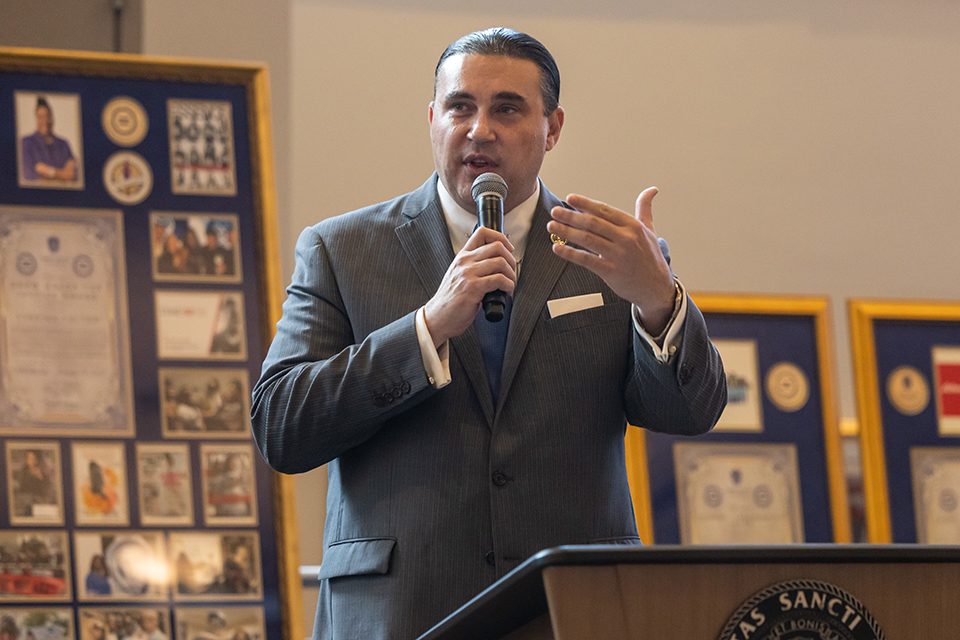 Michael McMillan, president and CEO of the Urban League of Metropolitan St. Louis, speaks during the Martin Luther King Jr. Memorial Tribute hosted by Saint Louis University and the Urban League of Metropolitan St. Louis on Jan. 11, 2023. Photo by Sarah Conroy. 