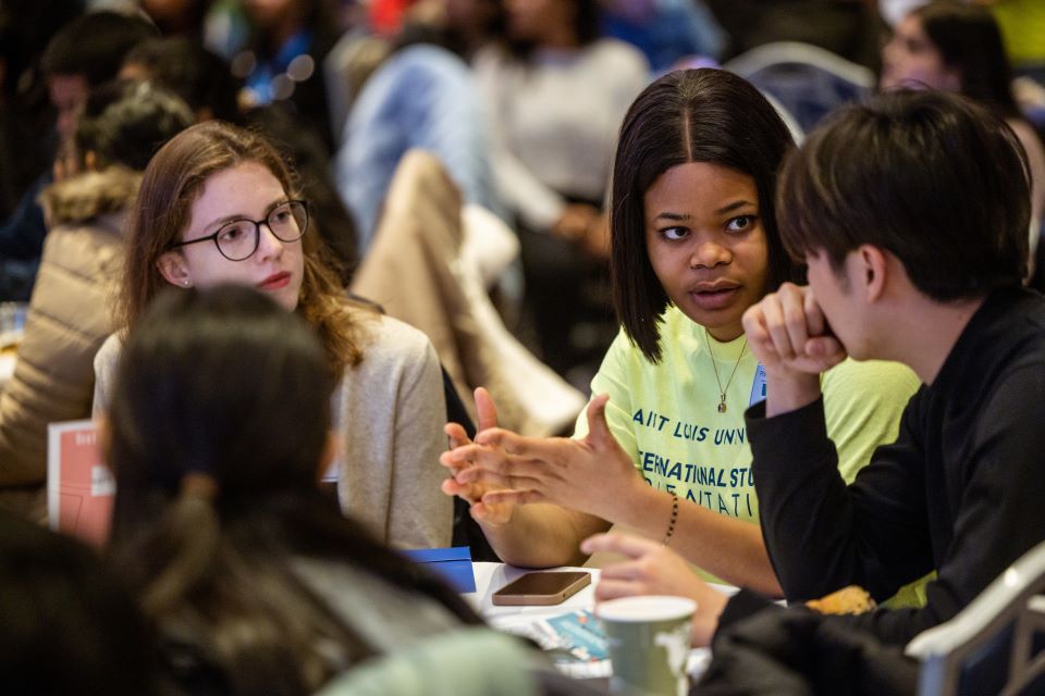 International Student Ambassador Prisca Enedah (second from right) answers questions during International Student Orientation on Jan. 12, 2023. Photo by Sarah Conroy. 