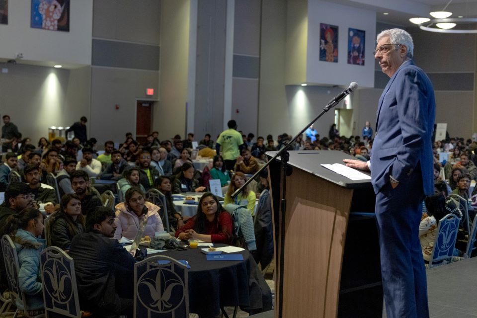 President Fred P. Pestello, Ph.D., addresses incoming international students during International Student Orientation on Jan. 12, 2023. Photo by Sarah Conroy. 