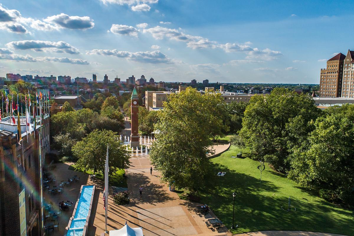 A view of SLU's clock tower and fountain, one of the most popular gathering places on campus on warm days.
