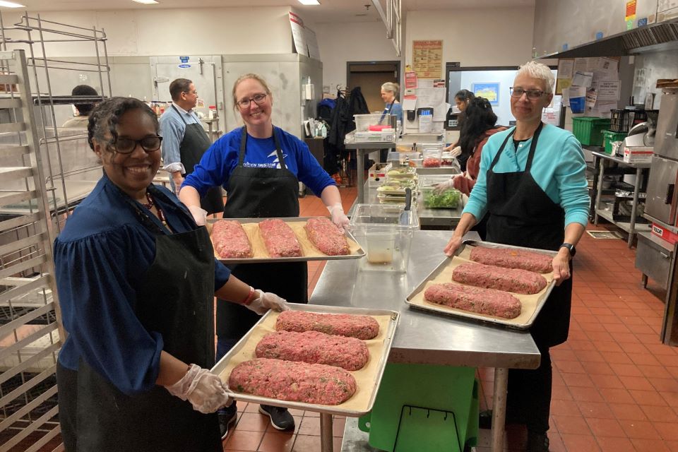 Members of the ICP @ SLU pilot program volunteer at Campus Kitchen. Submitted photo.