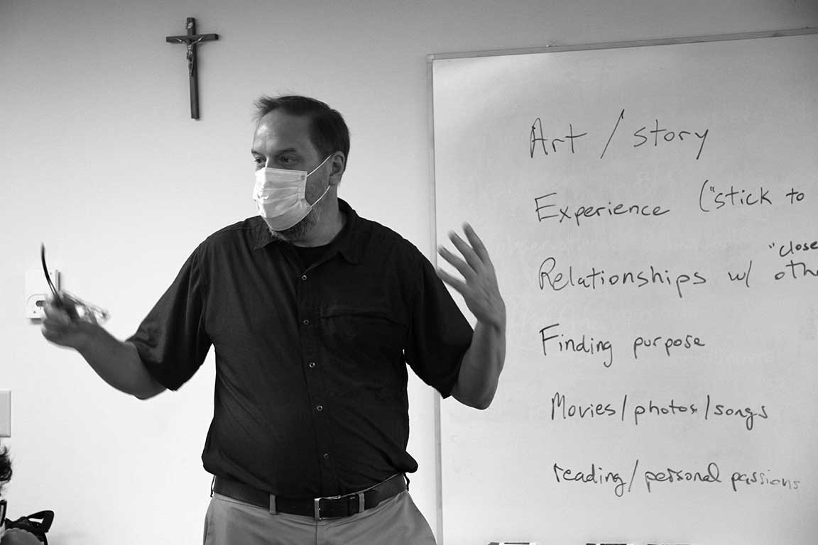 Dr. Bryan Sokol, Assistant Vice President, Center for Social Action and Associate Professor of Psychology leads a classroom discussion