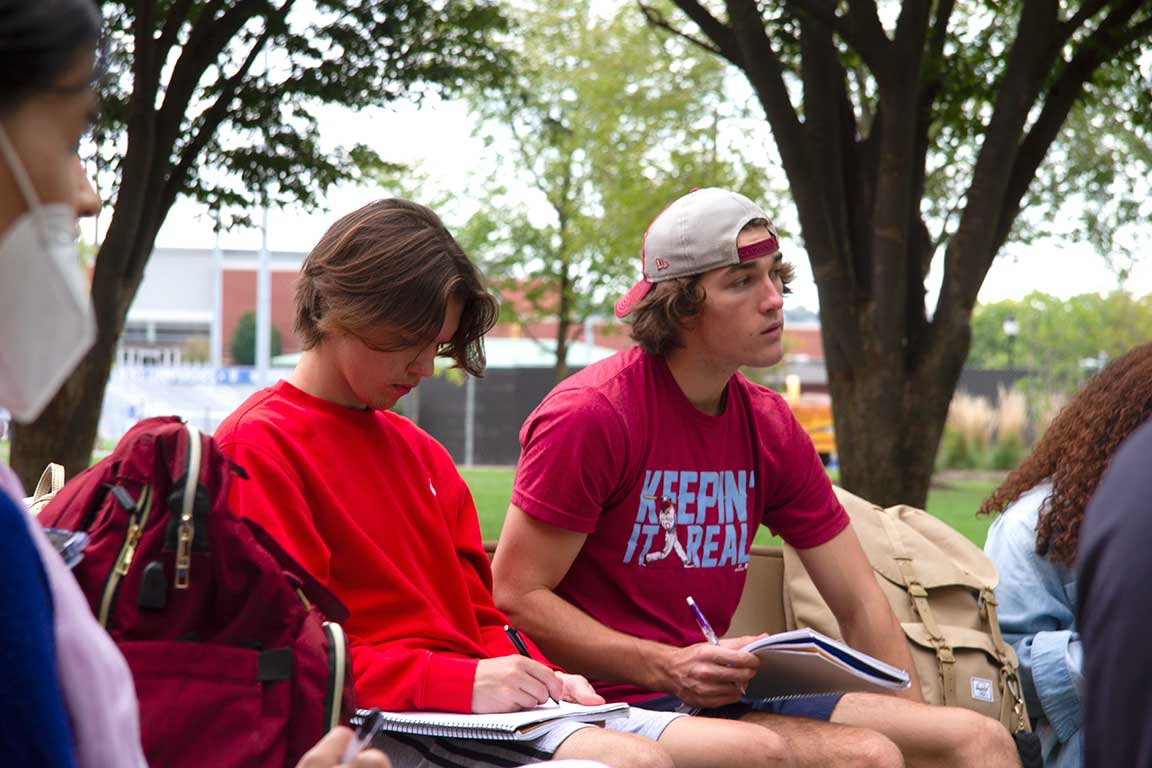 Students discuss core in group setting