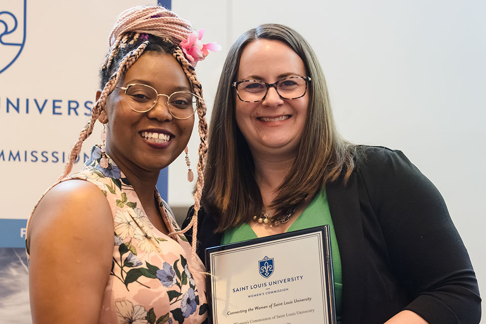 Luella Loseille, left, is honored during the 2023 Women of the Year Luncheon on April 24, 2023. She is pictured with Women’s Commission president Eliza Angarano. Photo by Sarah Conroy.