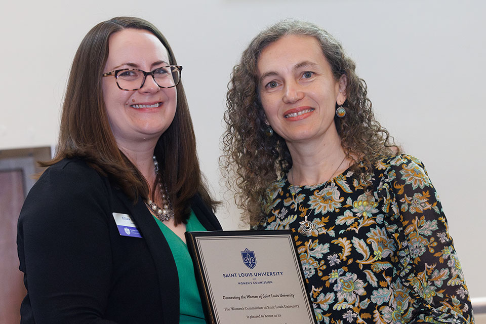 Silviya Zustiak, Ph.D, right, is honored during the 2023 Women of the Year Luncheon on April 24, 2023. She is pictured with Women’s Commission president Eliza Angarano. Photo by Sarah Conroy.