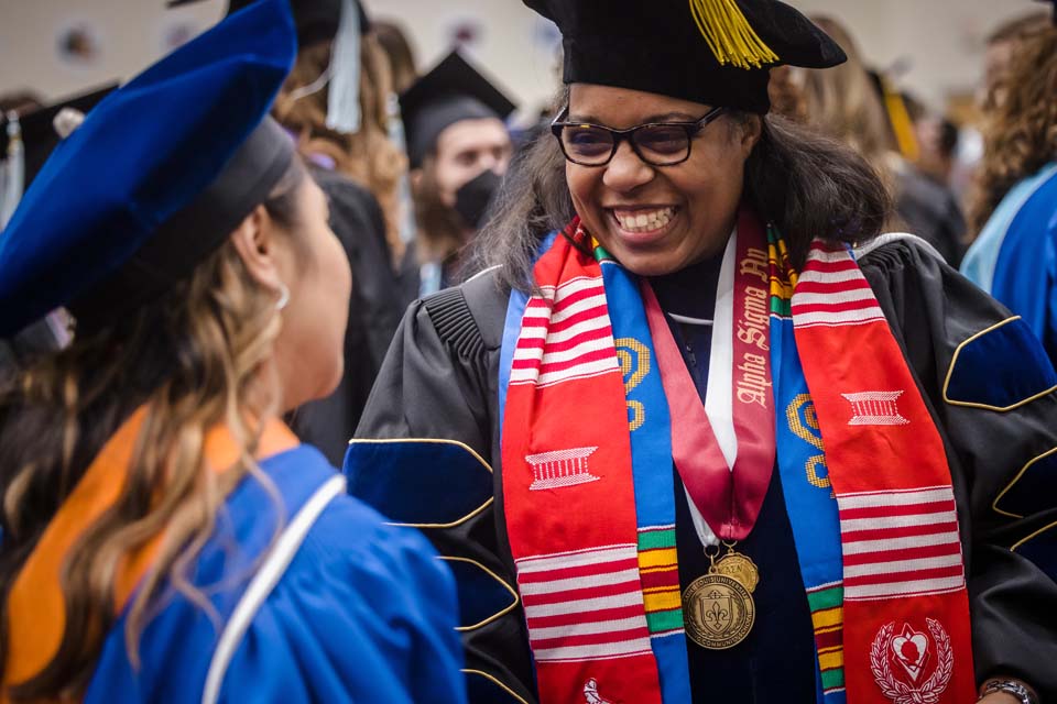 Manisha Ford-Thomas, Ph.D., director of Housing and Residence Life, smiles following commencement. Photo by Sarah Conroy.