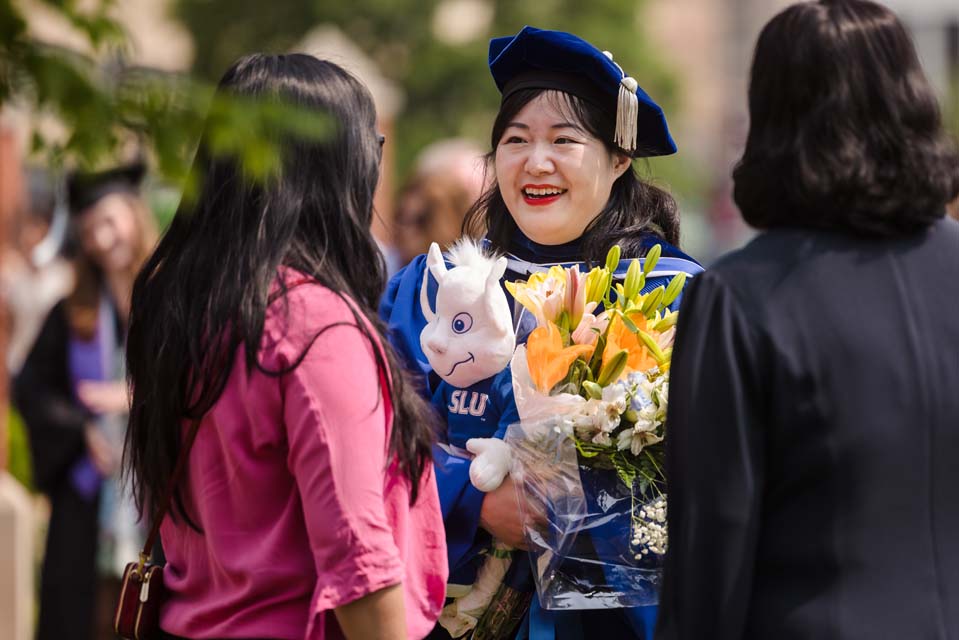 School of Education graduates celebrate on Thursday, May 18. Photo by Sarah Conroy.