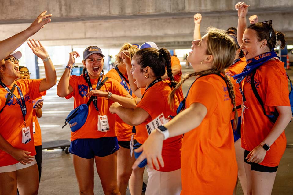 Members of Oriflamme dance in the parking garage during move-in on August 17, 2023. Photo by Sarah Conroy.