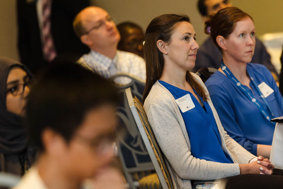 New faculty members listen to President Fred P. Pestello, Ph.D., during the new faculty orientation on Wednesday, Aug. 16. Photo by Sarah Conroy.
