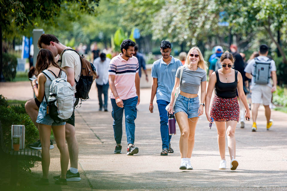Students walk to class for the first day of classes on Wednesday, Aug. 23. Photo by Sarah Conroy.