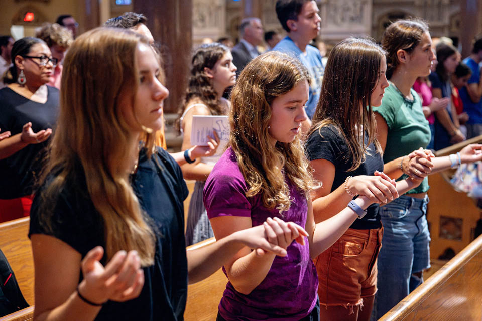 Students attend the Mass of the Holy Spirit in St. Francis Xavier College Church on  Thursday, Aug. 24. Photo by Sarah Conroy. 