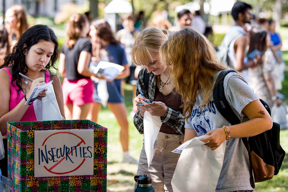 Students symbolically discard their insecurities during Fresh Check Day on Wednesday, Sept. 6. Photo Sarah Conroy.