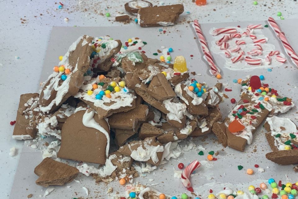 The remains of a crushed gingerbread house. Photo by Maggie Rotermund. 