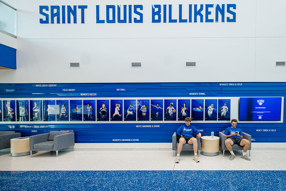Baseball players Will Bolinger (left) and Ben
Cherico in the Wool Family Lobby