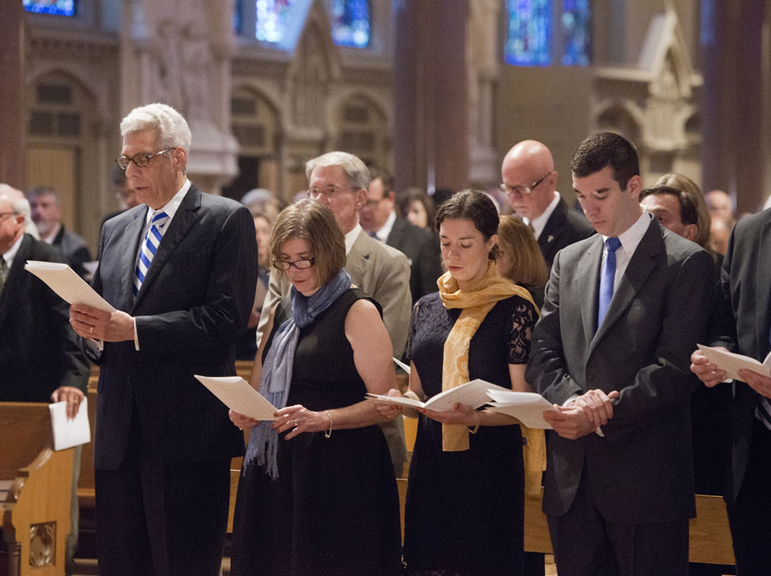 Saint Louis University President Fred P. Pestello, Ph.D., (left) with his family at a Mass at St. Francis Xavier College Church on Oct. 2, 2014, the eve of his formal inauguration. Photo courtesy of Saint Louis University.