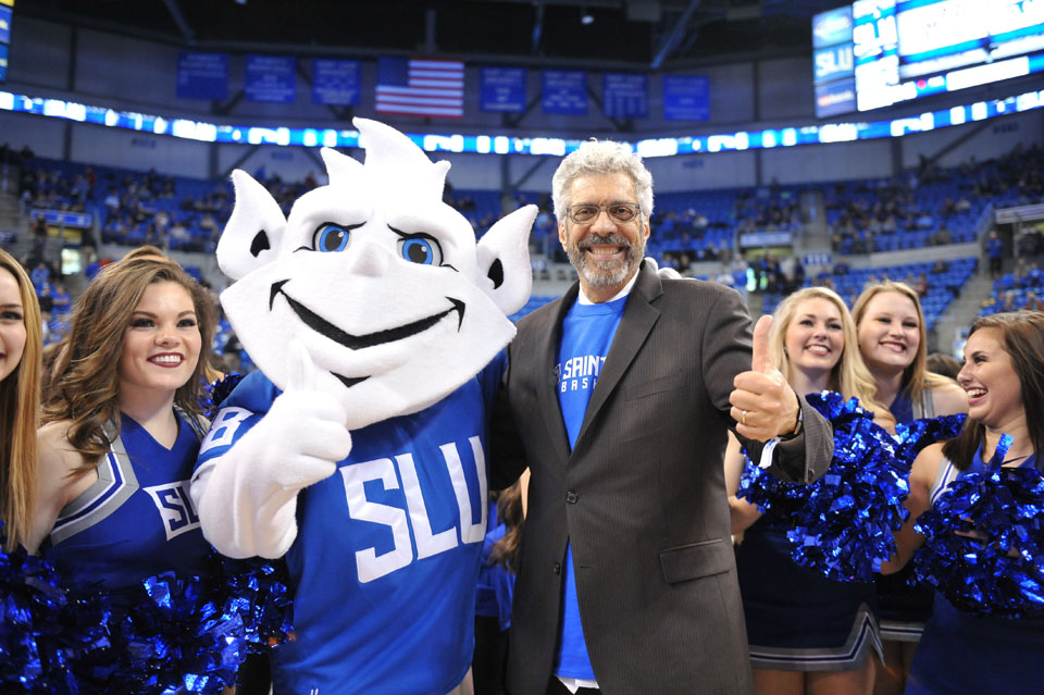 Saint Louis University President Fred P. Pestello, Ph.D., poses with the Billiken mascot during a men’s basketball game on Jan. 25, 2017, at Chaifetz Arena. Photo courtesy of Saint Louis University. 