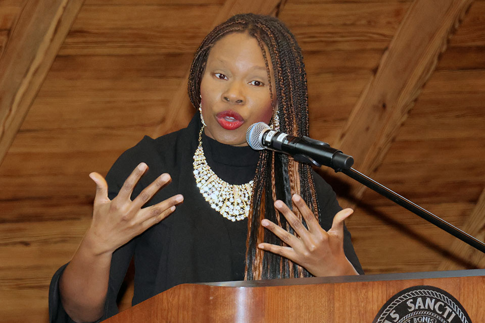 Dannielle Joy Davis, Ph.D., Education, this year’s recipient of the Reinert Center’s James H. Korn Scholarship of Teaching and Learning Award, spoke about her passion for teaching during the inaugural Celebration of Teaching event on Tuesday, March 26. Photo by Joe Barker. 
 