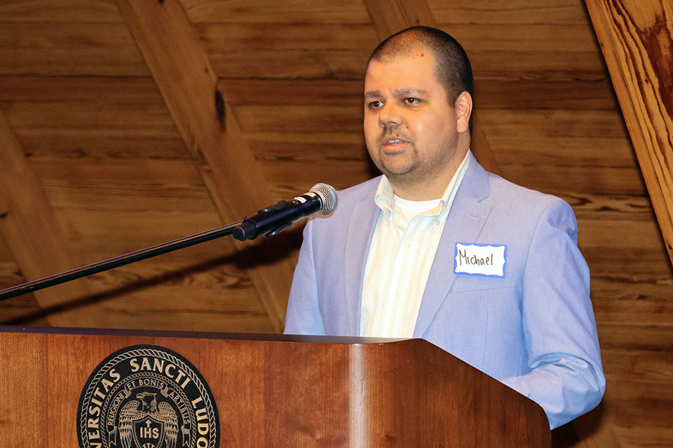 Michael Sinha, M.D., J.D., was recognized at the Scholarly Works and Grant Winners Reception on Friday, April 5. Photo by Joe Barker. 