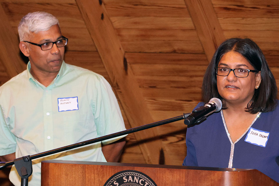 Sofia Origanti, Ph.D., right, and Edwin Antony, Ph.D., left, were recognized at the Scholarly Works and Grant Winners Reception on Friday, April 5. Photo by Joe Barker. 